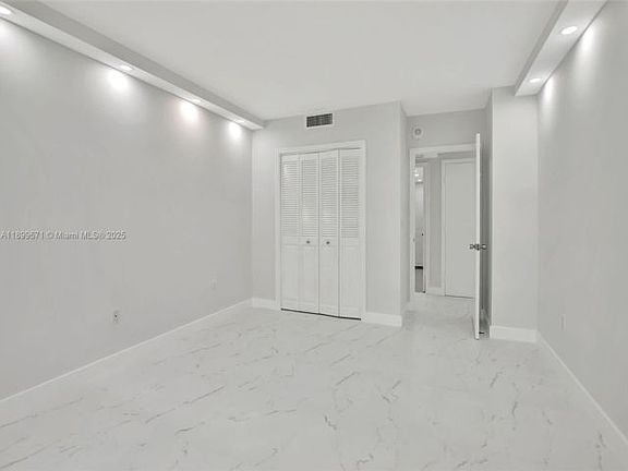 3rd image of 9801 Collins 15x Ave