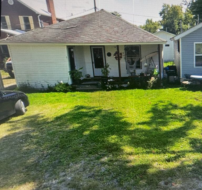 Front of cottage on Comstock next to Park- two parking spaces in front