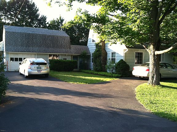 Left/West side w/Garage