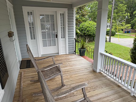 front porch provides nice protection when entering home on rainy days