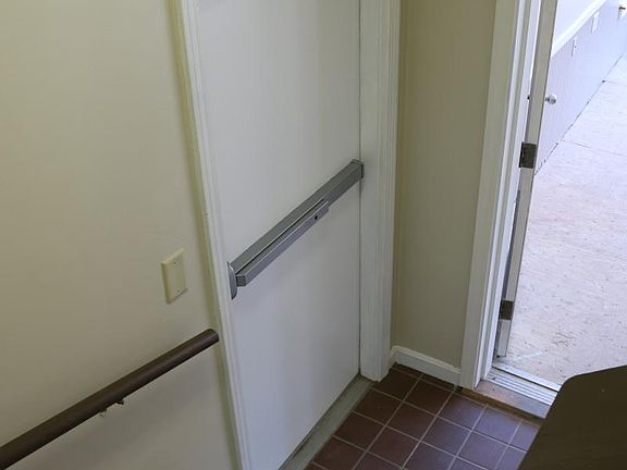 Security door entrance inside hallway