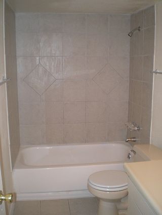 All-Tile Showers, Updated Bathrooms