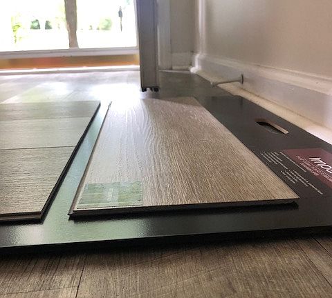 Newly installed plank flooring in all common areas.