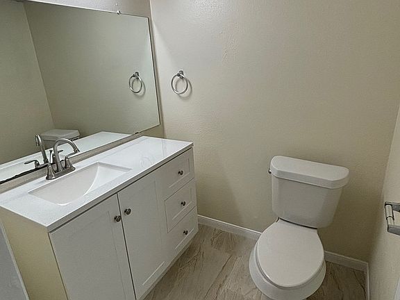 Primary half bathroom