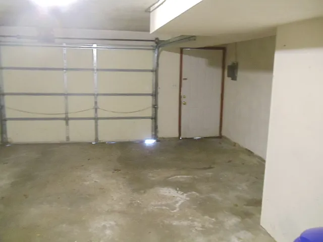 PICTURE OF PRIVATE GARAGE LOWER LEVEL OF THE APARTMENT