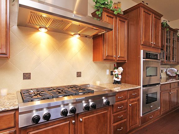 6 burner gas cooktop w/ grill, double ovens + microwave