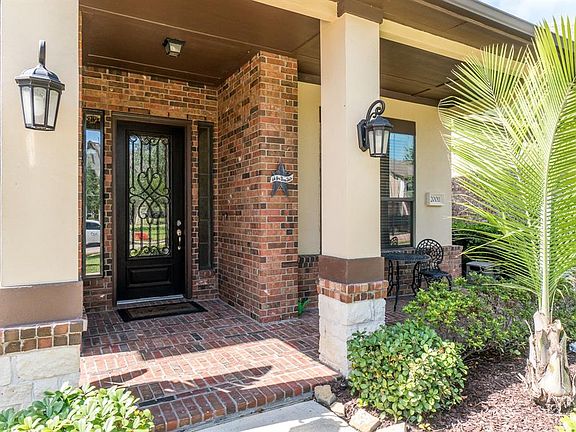 Step on up to this extended porch with the perfect sitting area off to the side. This is the perfect porch to sit and enjoy those chats with neighbors or warm cup of coffee on those cool weekend mornings.