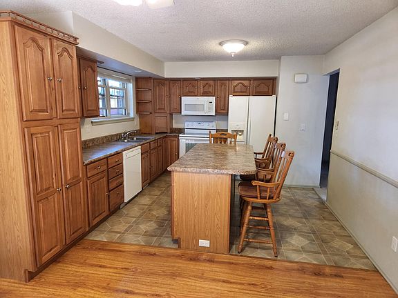 Kitchen with island and seating
