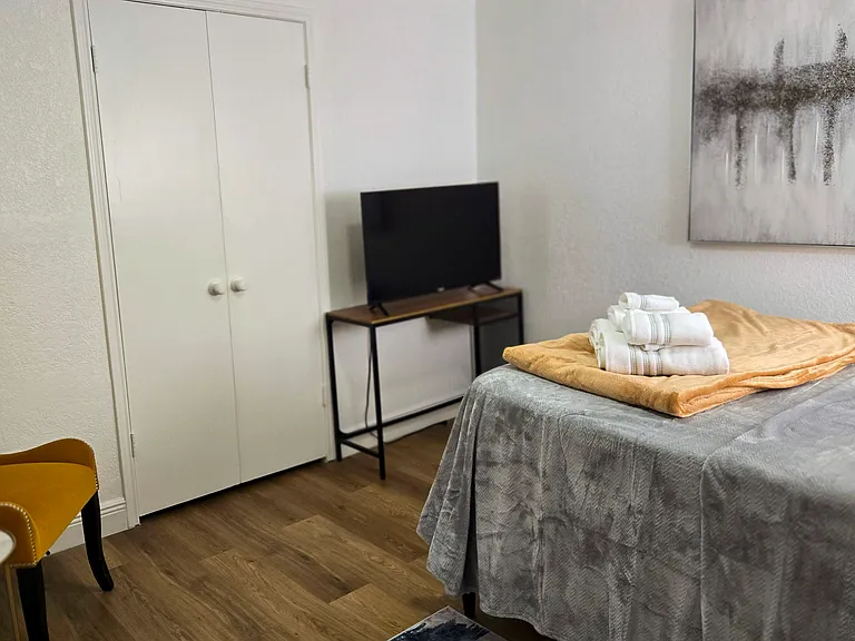 Bedroom view with Tv
