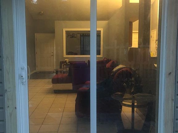 Backyard through living room to front door