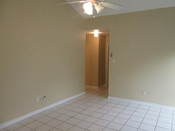 TILE ALL OVER INCLUDING IN LAGE MASTER