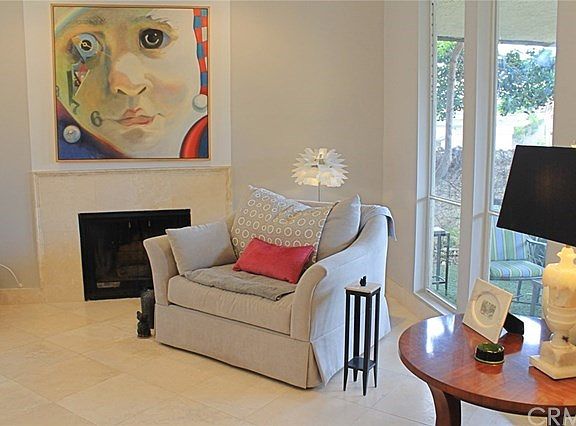 Windows facing stucco front courtyard enclosure