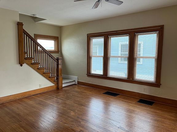 Living room floors refinished and walls/ceiling freshly painted.
