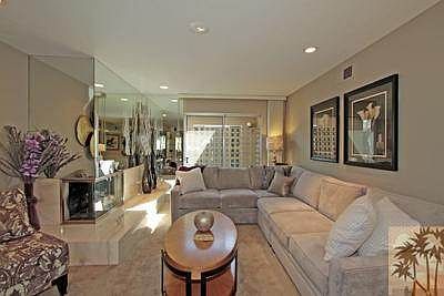 living area w/marble fireplace/hearth