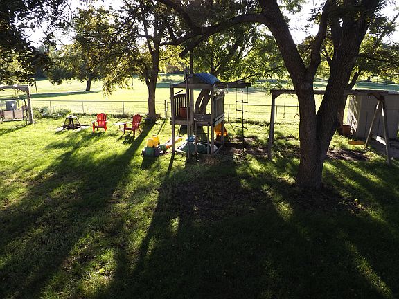 Shaded play-set and swings