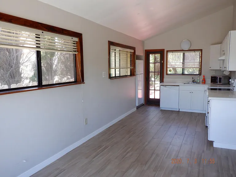 view to kitchen area from front slider