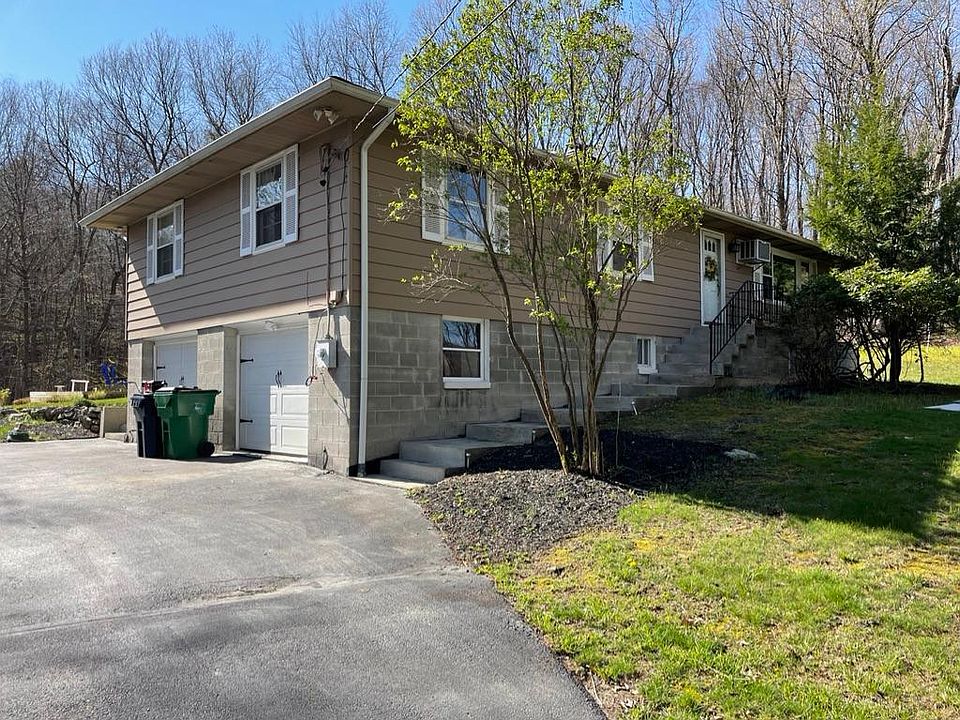 Outside of the house.