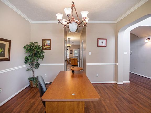 Another view of the dining room looking into the kitchen.
