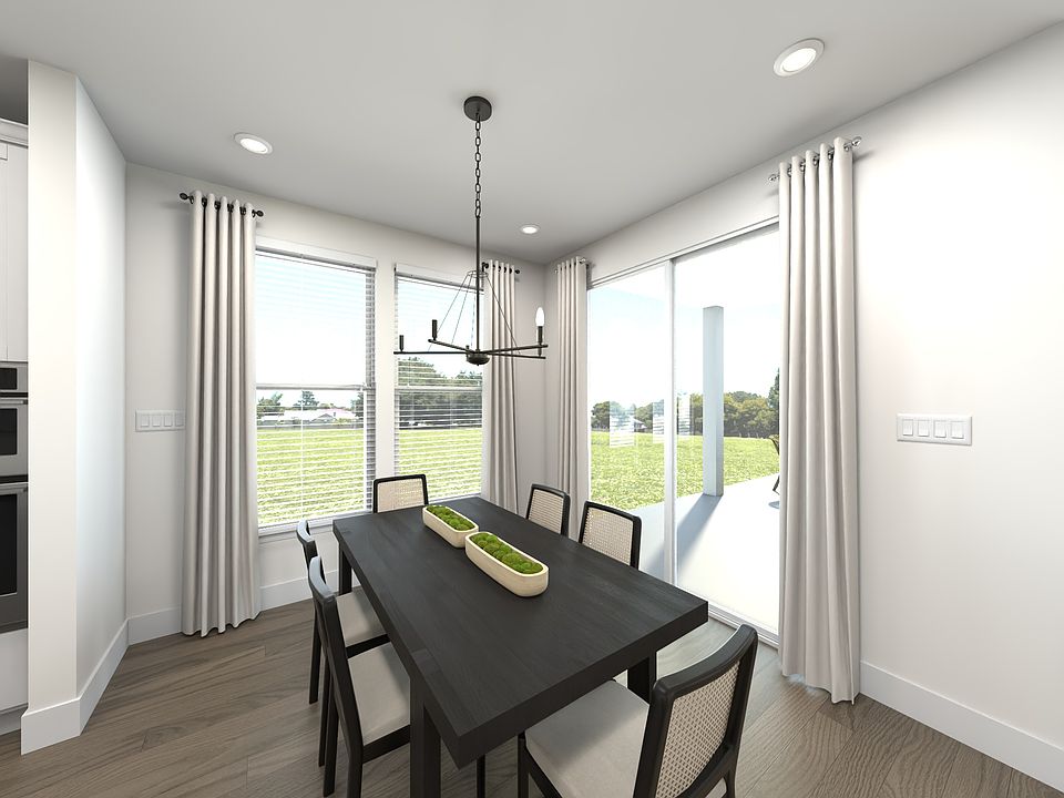 The open-concept floorplan allows for an easy flow between the kitchen and dining areas.