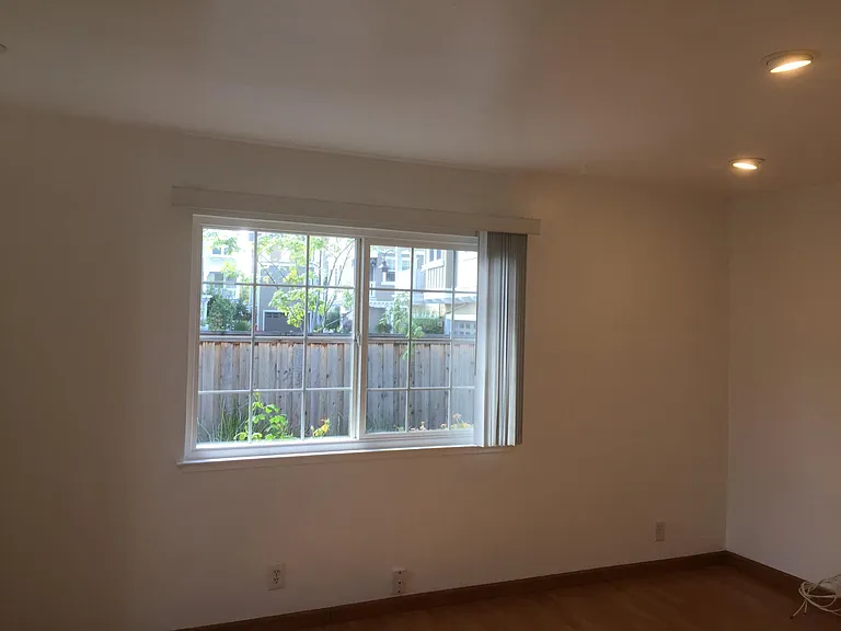 recess lights in living room, wide double pane window, cable and phone ready