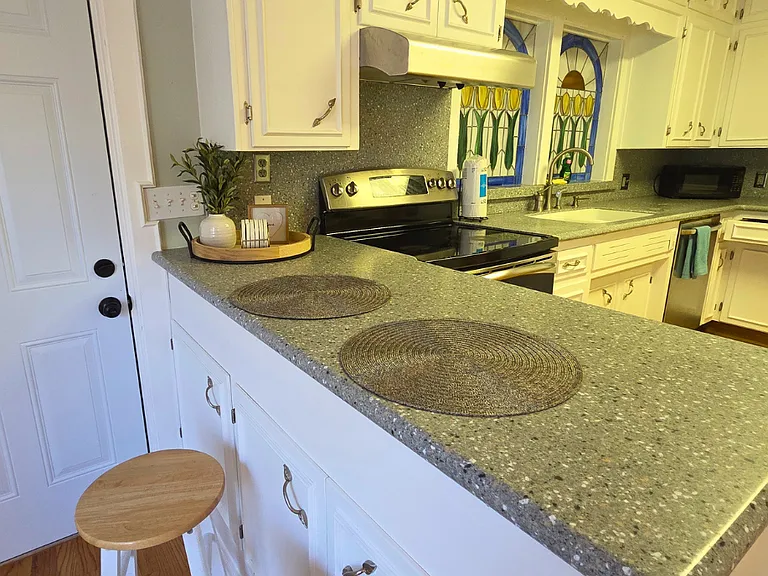 Bright kitchen with breakfast bar for extra comfort