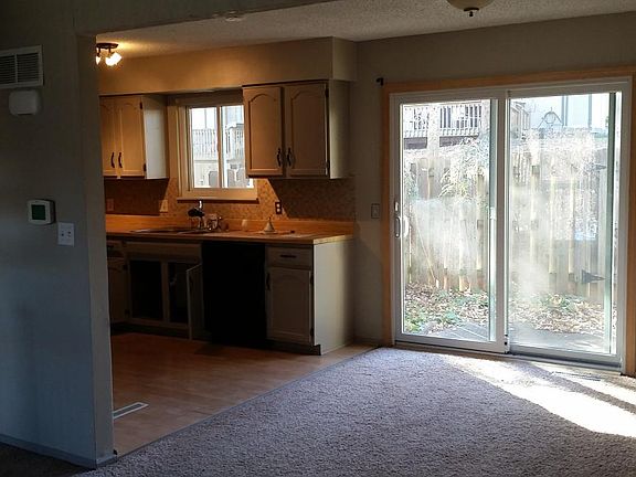 Dining area; sliding door to fenced private patio