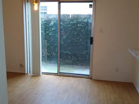 Dining room with sliding glass door to your private patio.