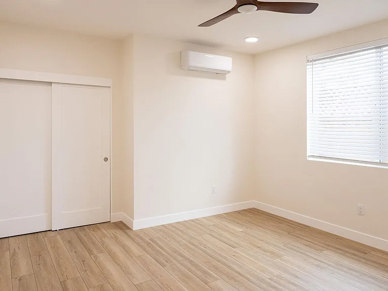large bedroom with room for a king bed.