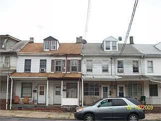 2nd image of 214 W 2nd St