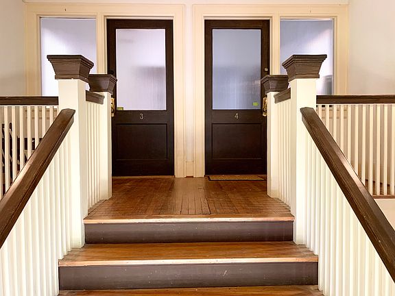 Apartment is on the left.