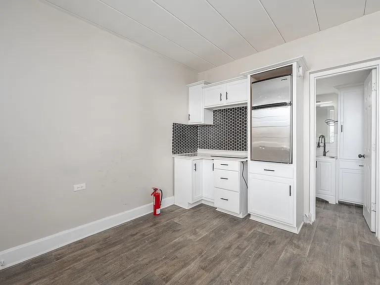 Experience modern living with this sleek and stylish kitchen design.