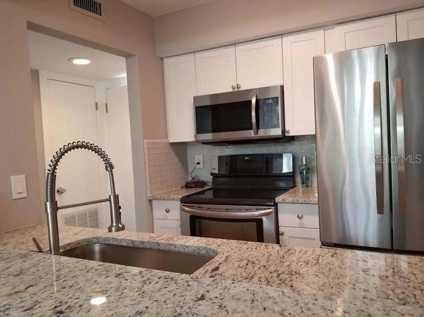 1 Bedroom, 1 1/2 Bath Loft condo at 5101 Eaglesmere Drive, Unit B03, Orlando, FL 32819 — Photo 3