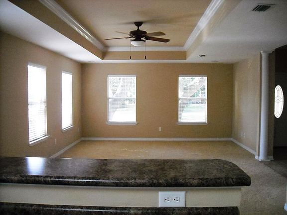 Living room/trayed ceilings/blinds/fans