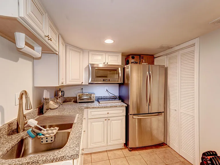 View of Kitchen with additional storage closet!