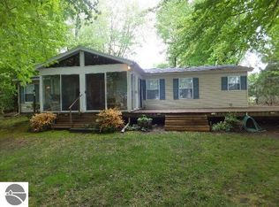 7896 N Shore Ct, Grawn, MI 49637
