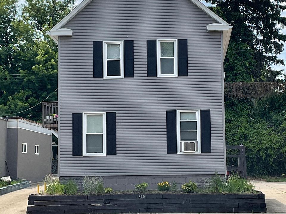 Front of 890 N. Main Street. This apartment is the entire first floor and has a separate entrance with a small stairway.