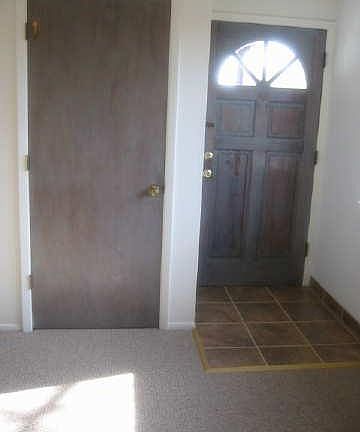 View from Kiva fireplace to front door
