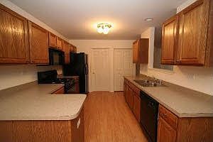 Updated kitchen has lots of counter space and cabinets