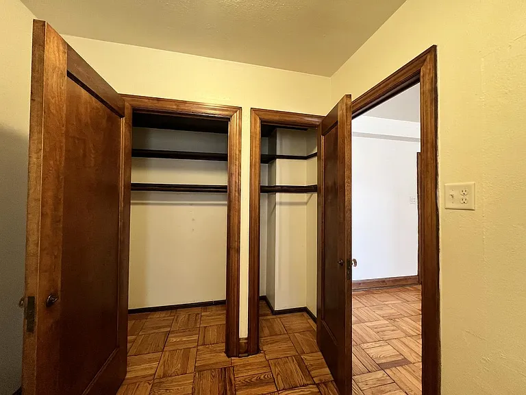 Two closets in dressing room.