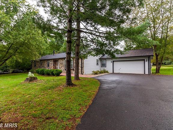 LONG PAVED DRIVEWAY