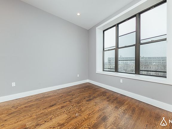 5th image of 60-15 Myrtle Ave #Y