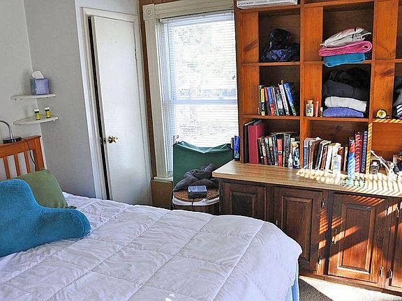 Sleeping area with built-in shelving