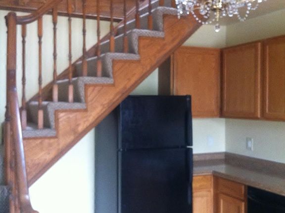 Kitchen on main floor stairway to bedrooms, bath and laundry