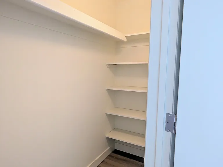 One of Two Closets in Master Bedroom