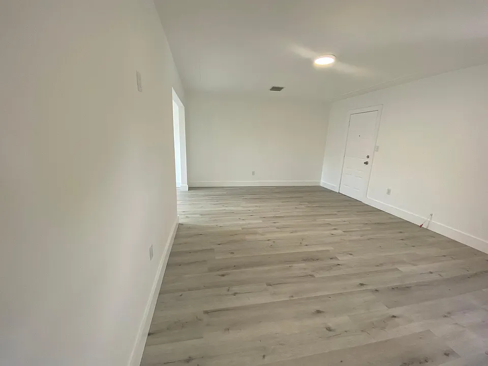 Living Room with front door entrance.