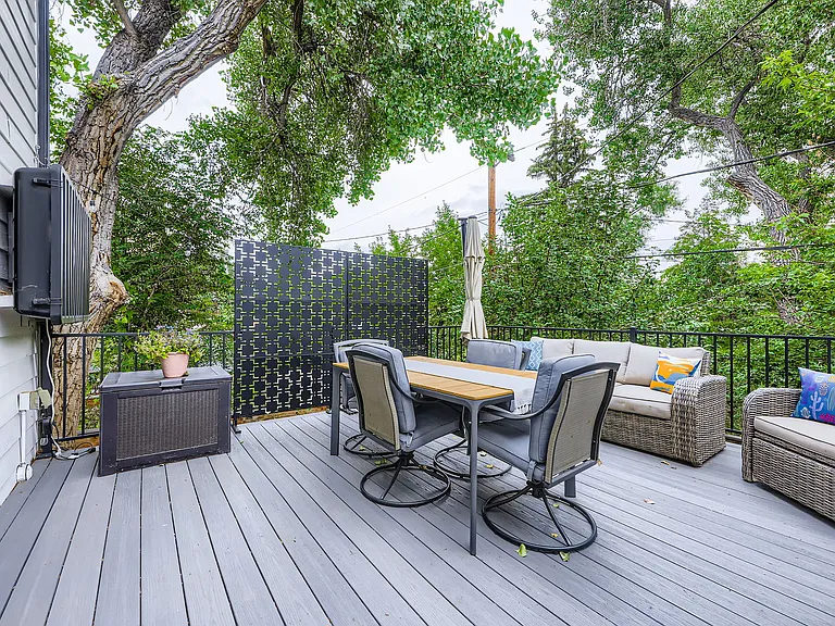 2nd level deck - large enough for grill, outdoor dining, couches. Stormshell for TV optionally included.