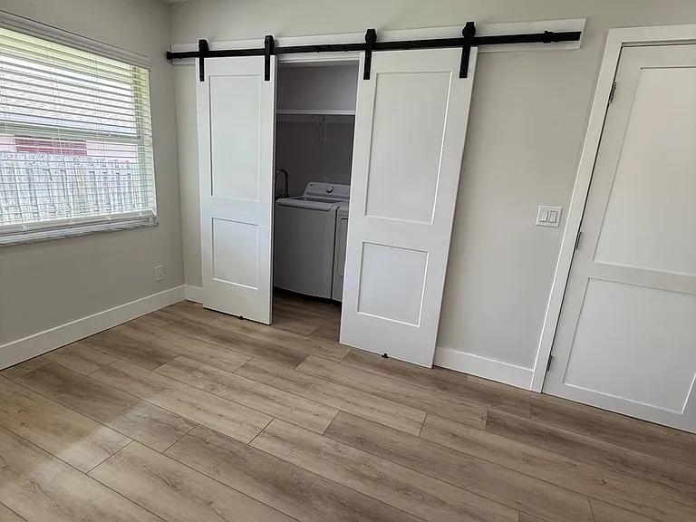 Laundry area, door to right is to garage
