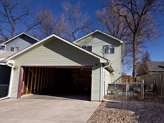 Two car attached garage (facing quiet alley)