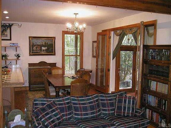 Dining room opens to sunroom