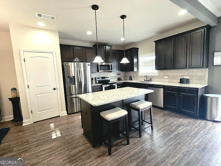 9025 Holder Rd — Photo 2